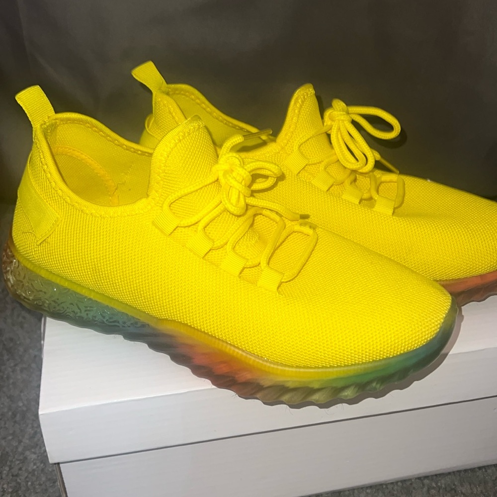 Bright yellow Wanted sneakers with rainbow sole